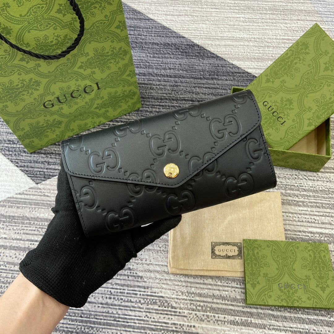 GUCCI CONTINENTAL WALLET 19 IN BLACK EMBOSSED CALFSKIN GOLD HARDWARE