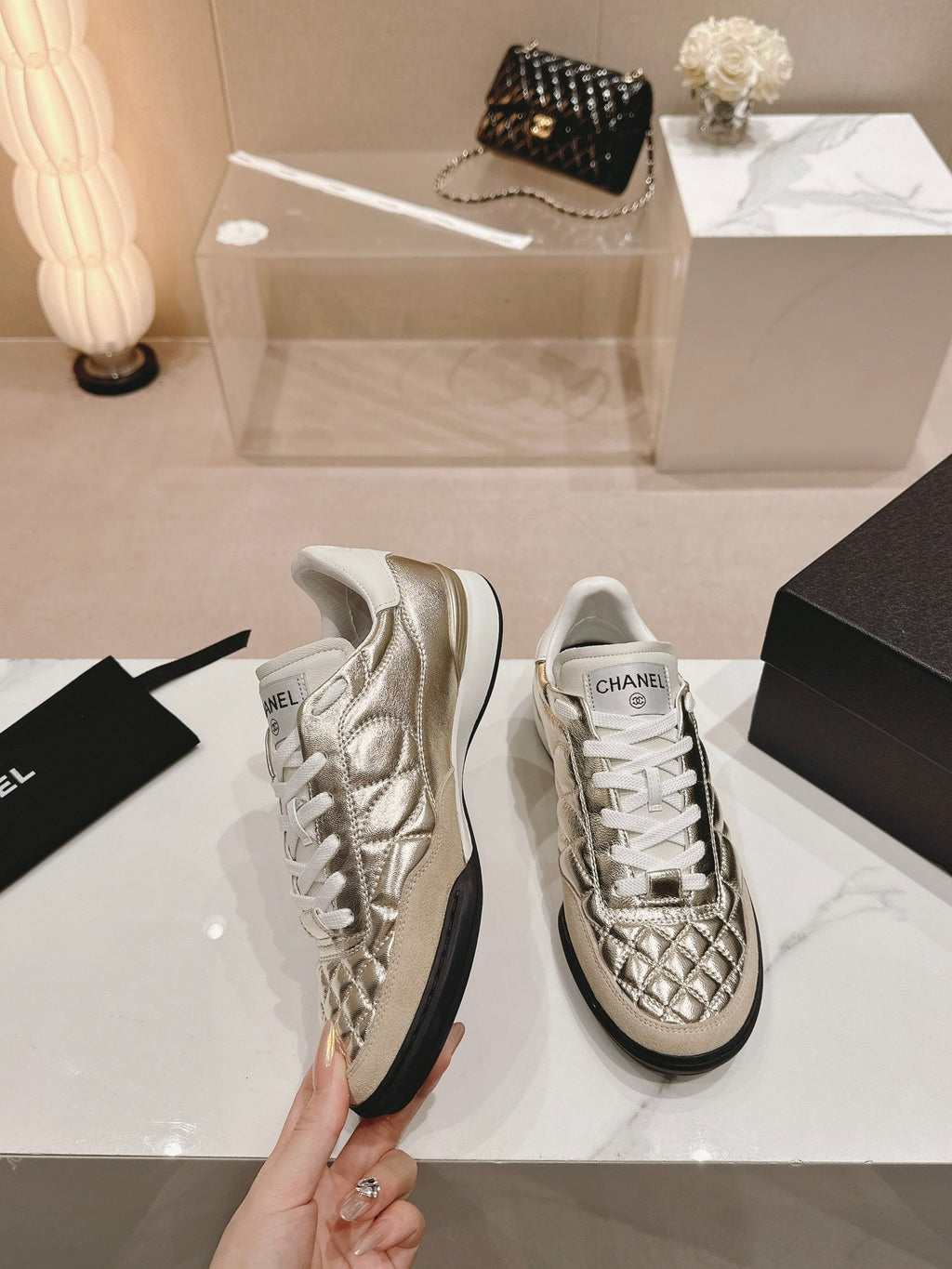 CHANEL SNEAKERS IN GLOSSY GOLDEN LAMBSKIN