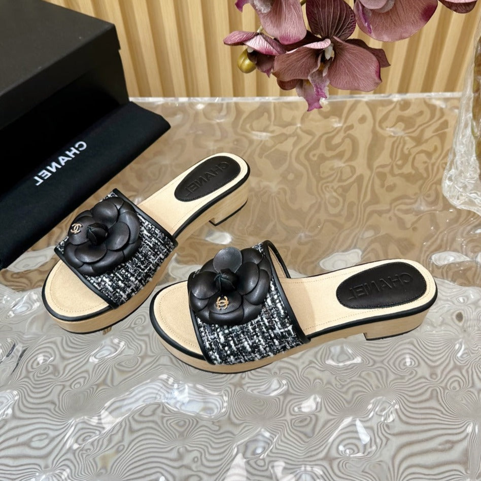 CHANEL PLATFORM SLIPPERS WITH FLOWER IN BLACK LAMBSKIN