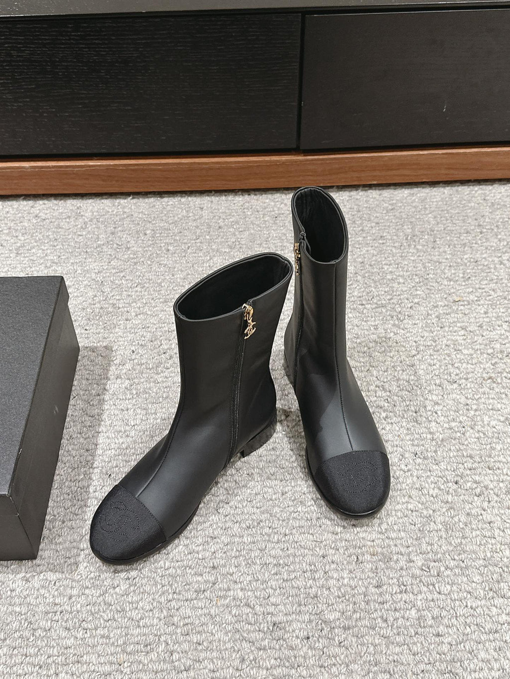 CHANEL SHORT BOOTS IN BLACK LAMBSKIN AND FABRIC