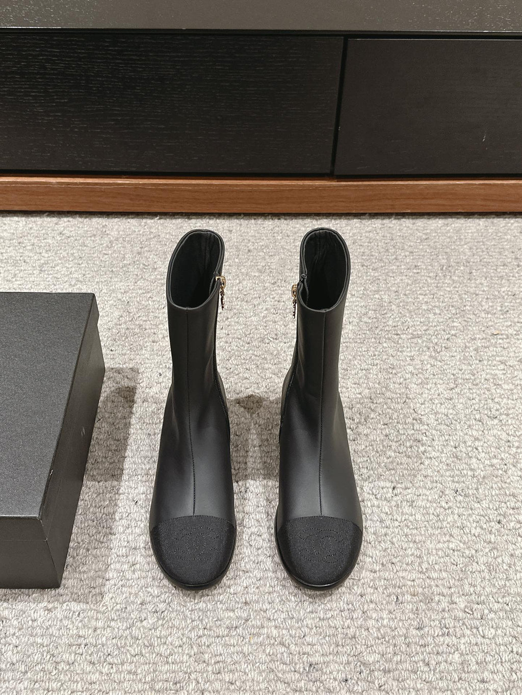 CHANEL SHORT BOOTS IN BLACK LAMBSKIN AND FABRIC
