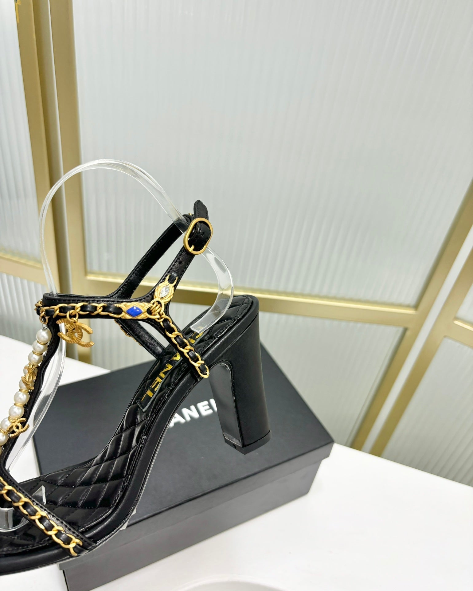 CHANEL HIGH HEELS PEARL CHAIN IN BLACK COWHIDE