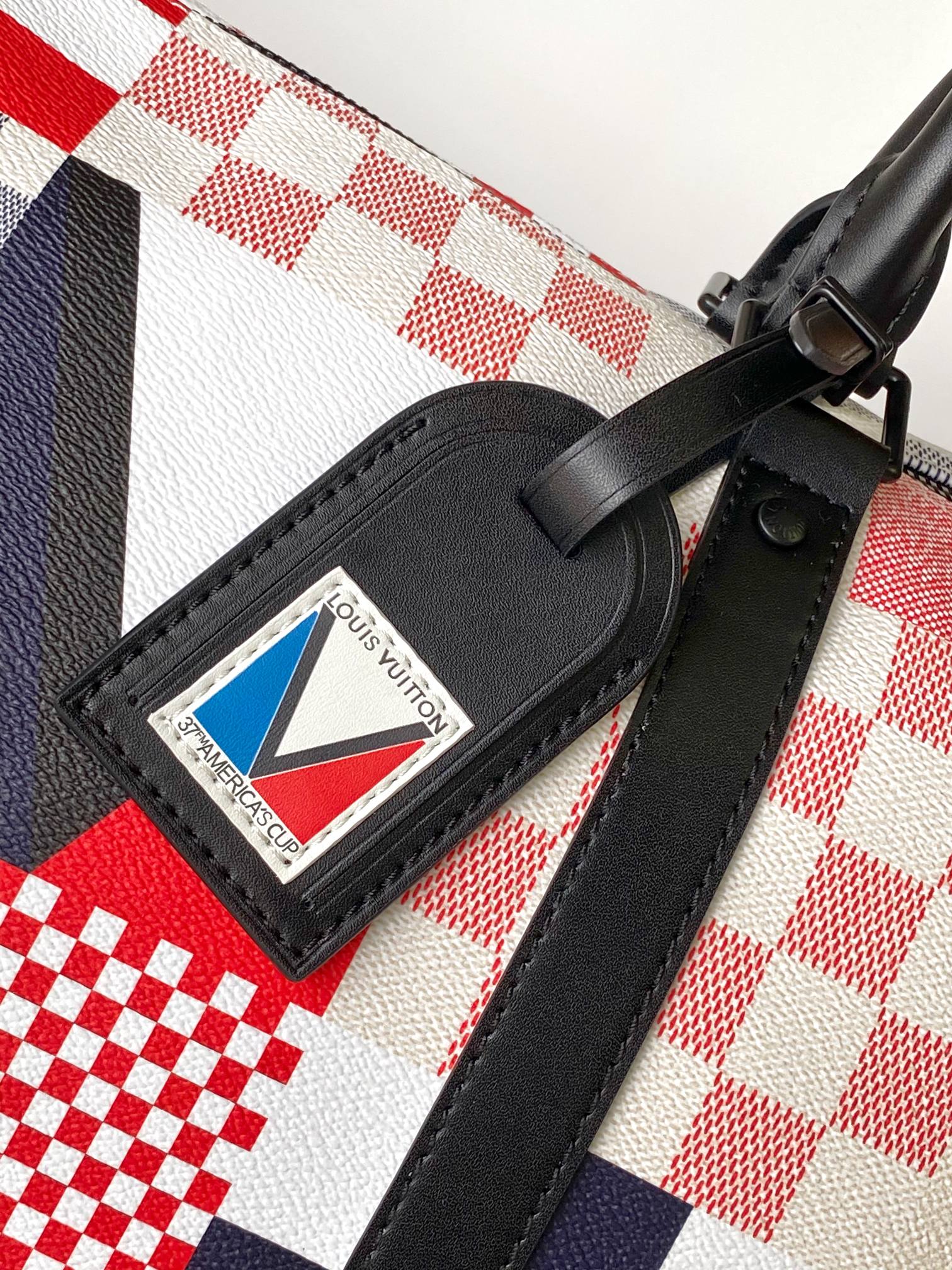 LOUIS VUITTON LV 25S SAC KEEPALL BANDOULIÈRE 50 IN MULTICOLOR CANVAS AND CALFSKIN TRIM
