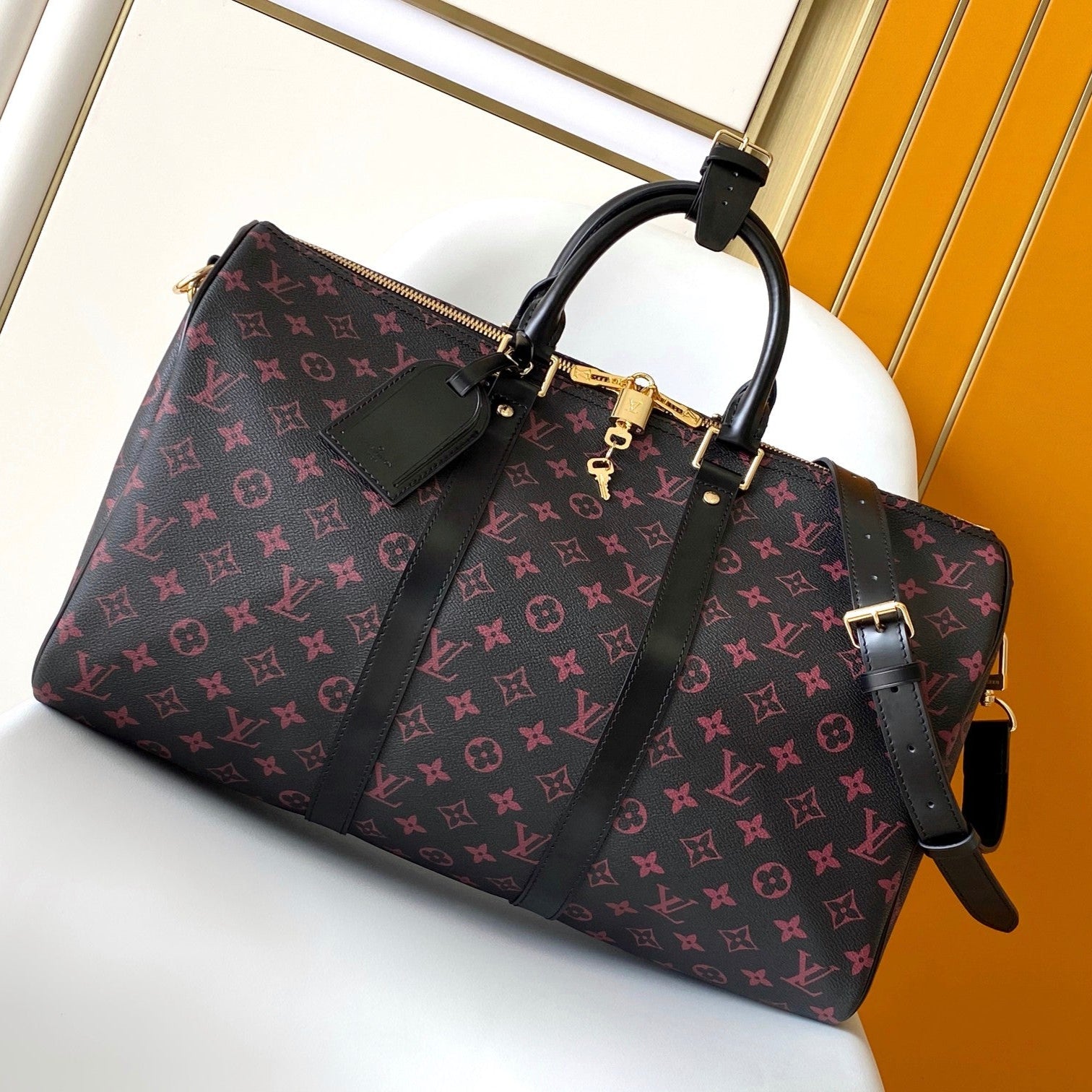 LOUIS VUITTON KEEPALL BANDOULIÈRE 45 IN BLACK MONOGRAM TOMETTE CANVAS