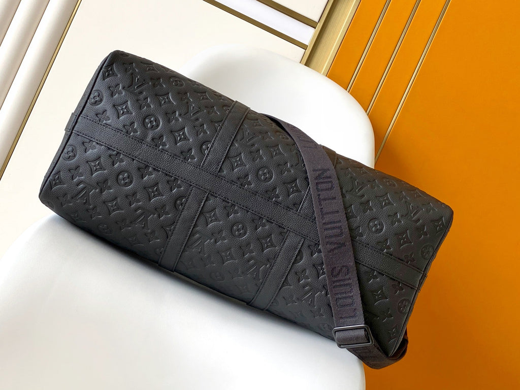 LOUIS VUITTON LV 25S KEEPALL BANDOULIÈRE BAG 50 IN BLACK EMBOSSED TAURILLON CALFSKIN MONOGRAM