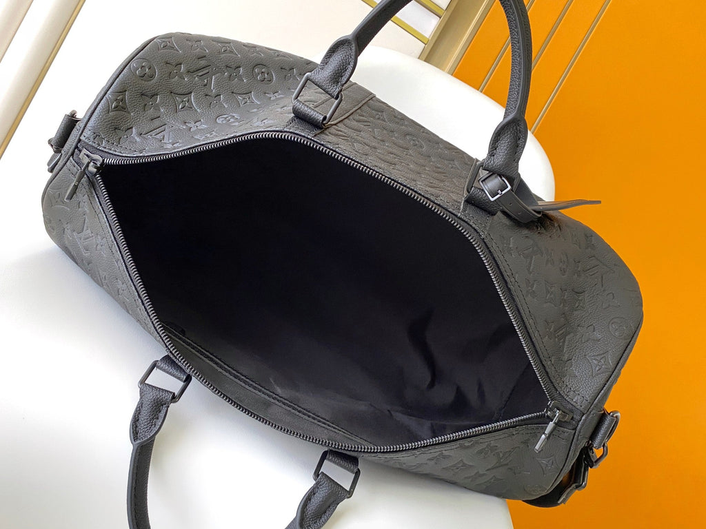 LOUIS VUITTON LV 25S KEEPALL BANDOULIÈRE BAG 50 IN BLACK EMBOSSED TAURILLON CALFSKIN MONOGRAM