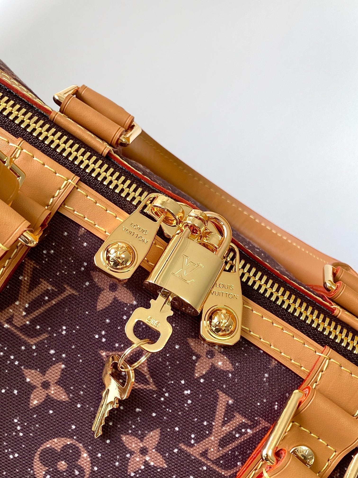 LOUIS VUITTON LV 25S KEEPALL 50 MONOGRAM CRYSTALS IN DARK PURPLE CANVAS AND CALFSKIN TRIM