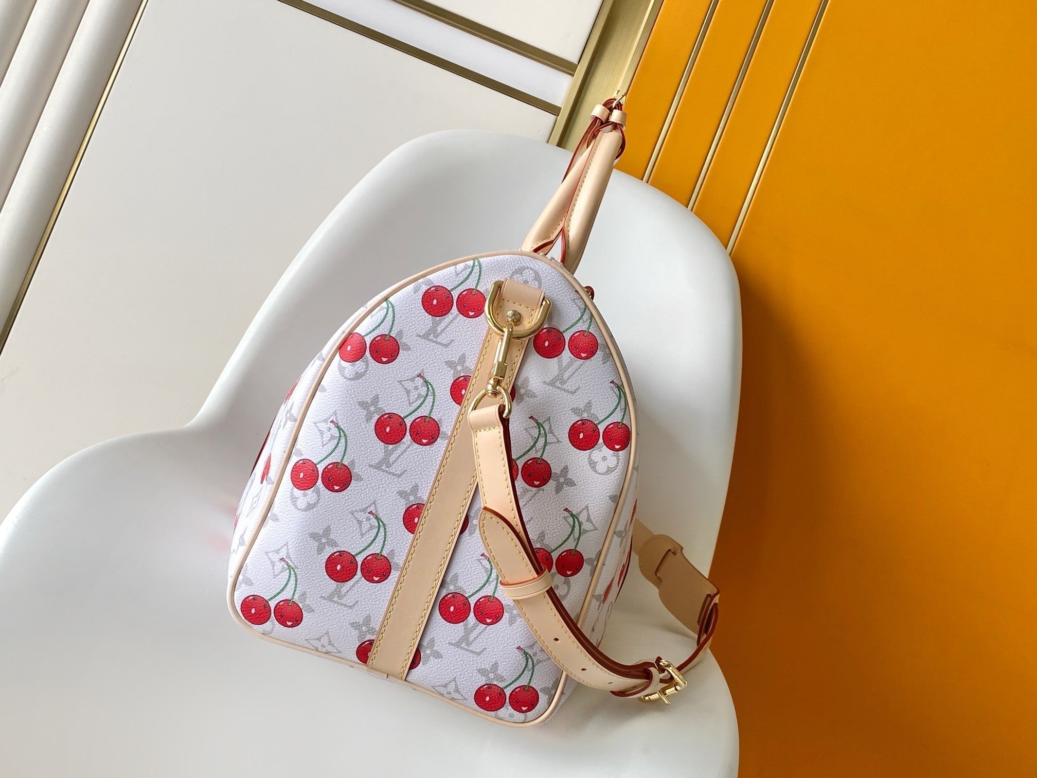 LOUIS VUITTON KEEPALL BANDOULIÈRE 45 IN WHITE AND RED CALFSKIN