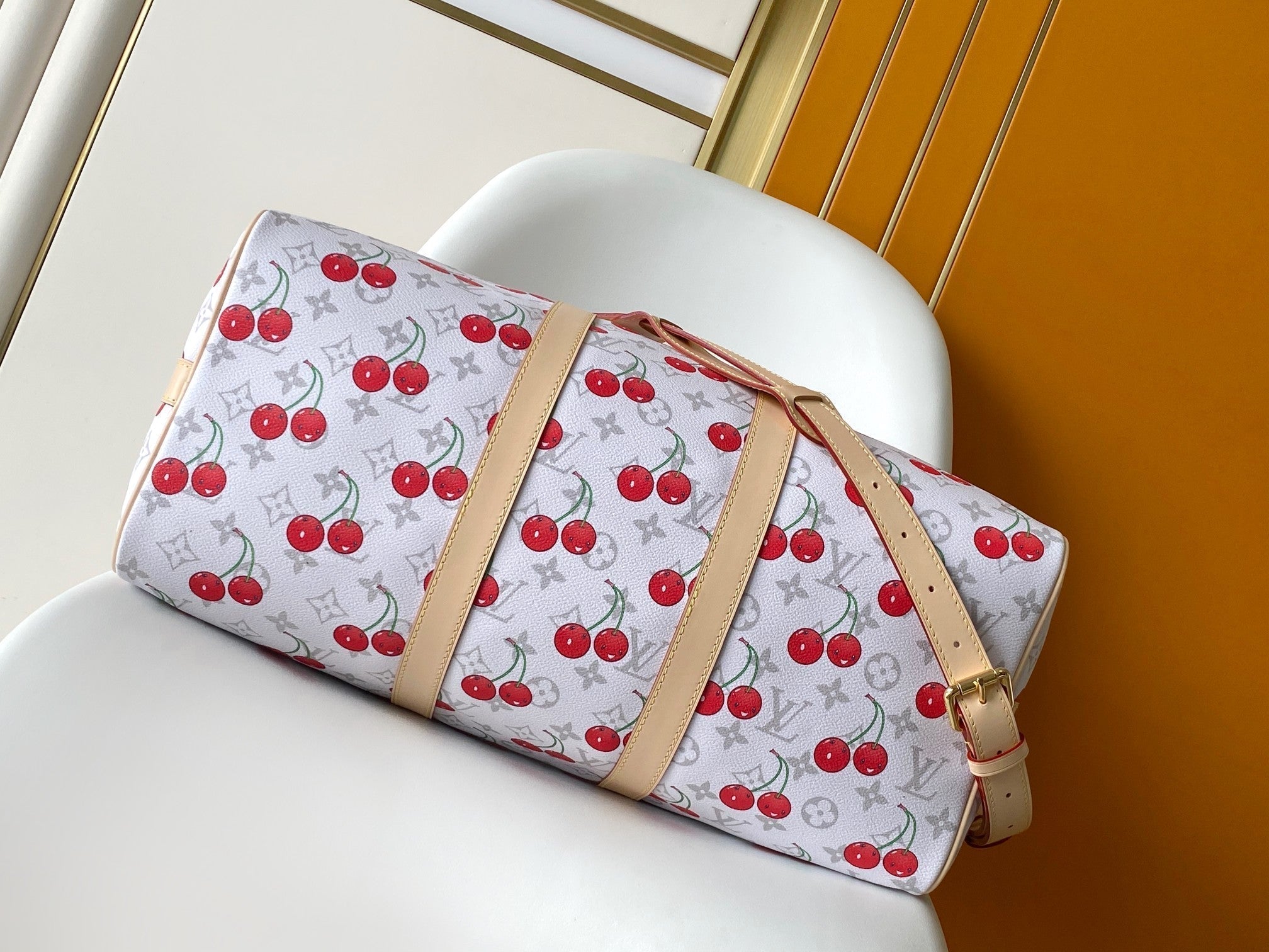 LOUIS VUITTON KEEPALL BANDOULIÈRE 45 IN WHITE AND RED CALFSKIN