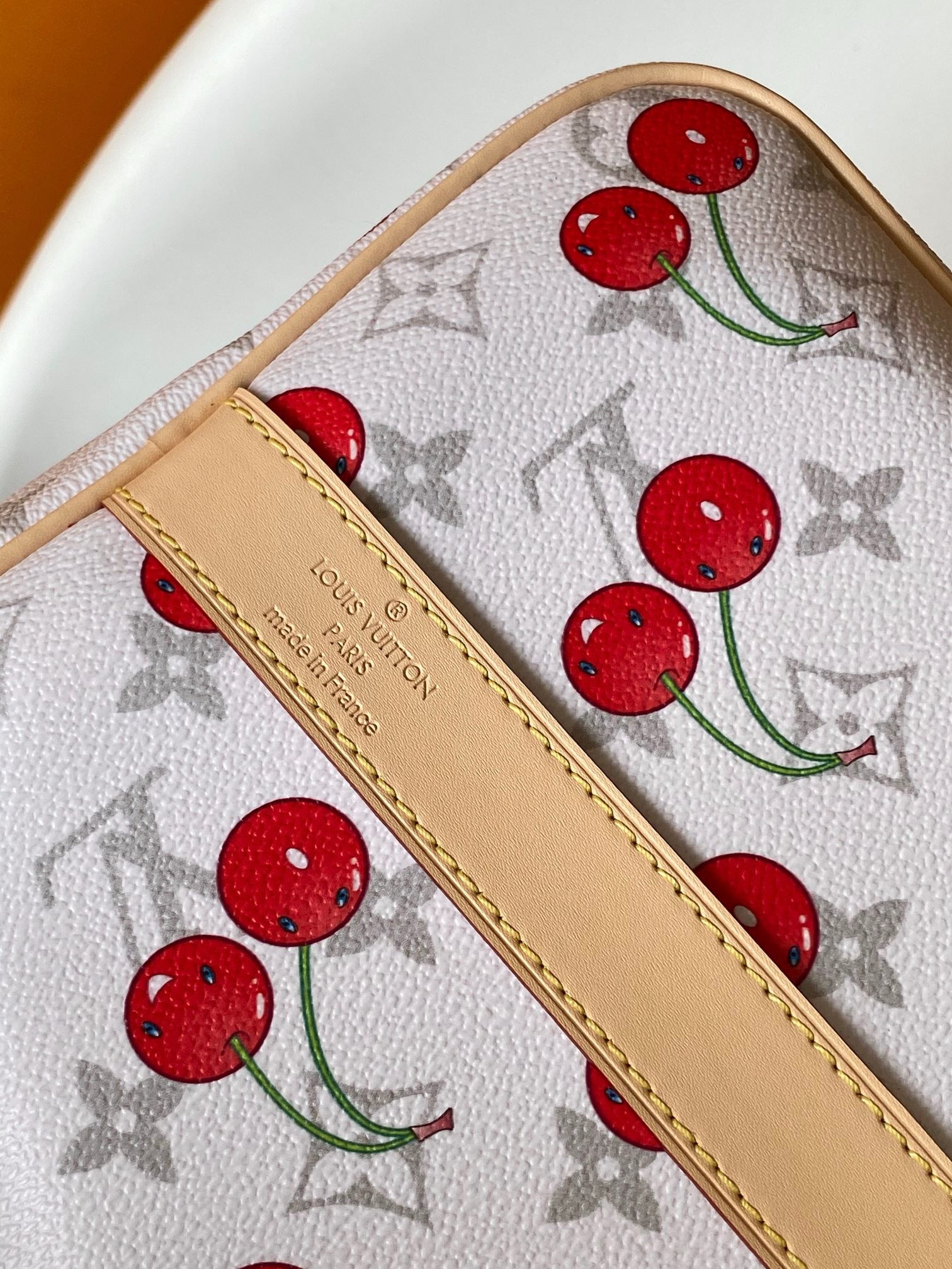 LOUIS VUITTON KEEPALL BANDOULIÈRE 45 IN WHITE AND RED CALFSKIN