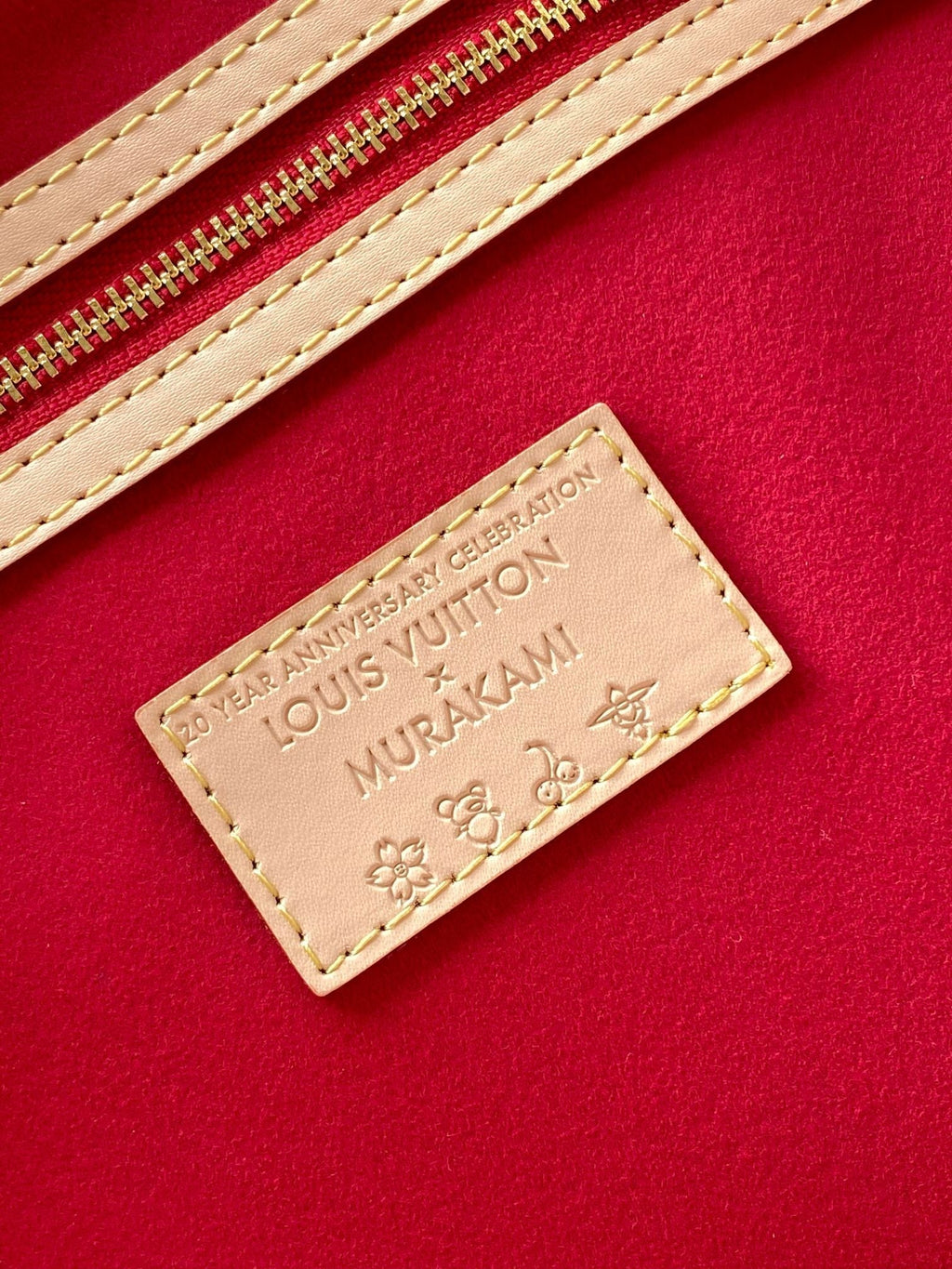 LOUIS VUITTON KEEPALL BANDOULIÈRE 45 IN WHITE AND RED CALFSKIN