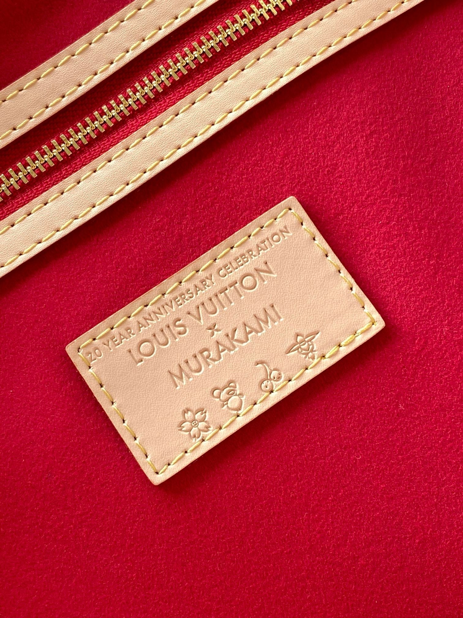 LOUIS VUITTON KEEPALL BANDOULIÈRE 45 IN WHITE AND RED CALFSKIN