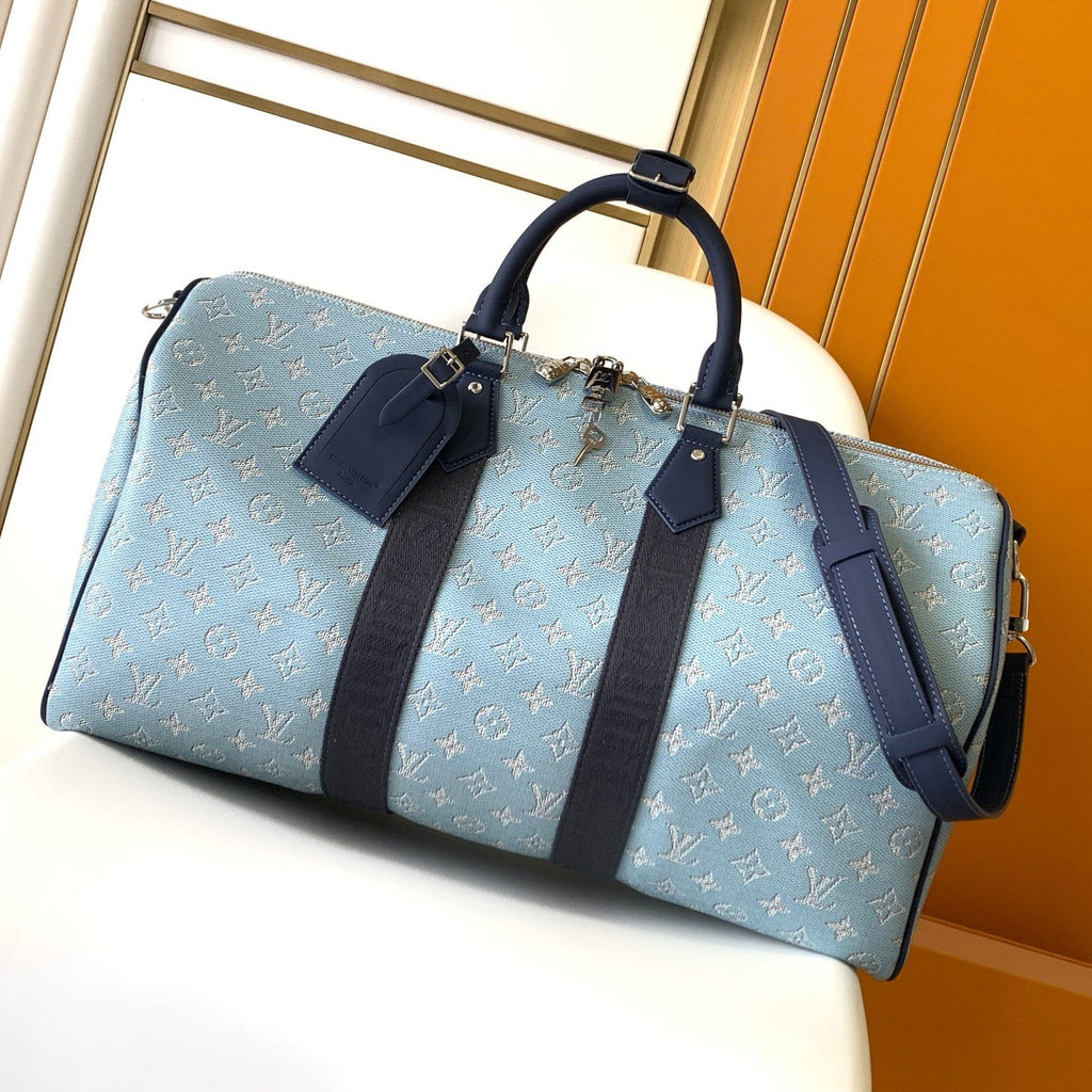 LOUIS VUITTON LV 25S KEEPALL BANDOULIÈRE BAG 50 IN BLUE MONOGRAM HERITAGE CALFSKIN