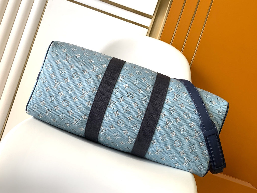 LOUIS VUITTON LV 25S KEEPALL BANDOULIÈRE BAG 50 IN BLUE MONOGRAM HERITAGE CALFSKIN