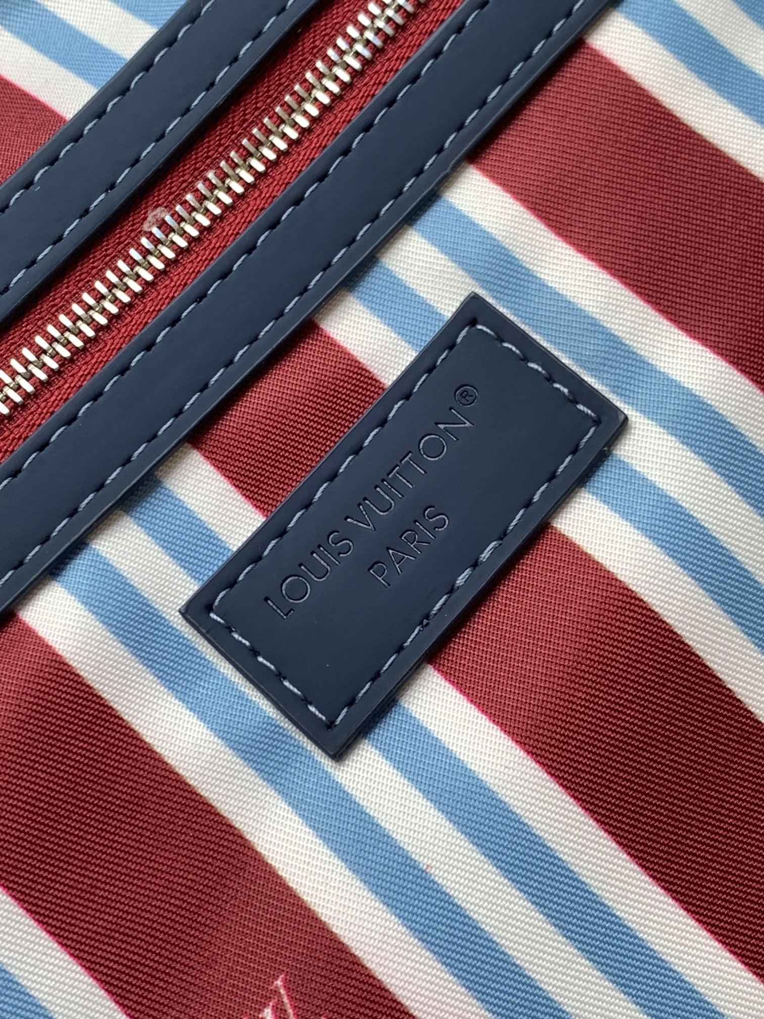LOUIS VUITTON LV 25S KEEPALL BANDOULIÈRE BAG 50 IN BLUE MONOGRAM HERITAGE CALFSKIN