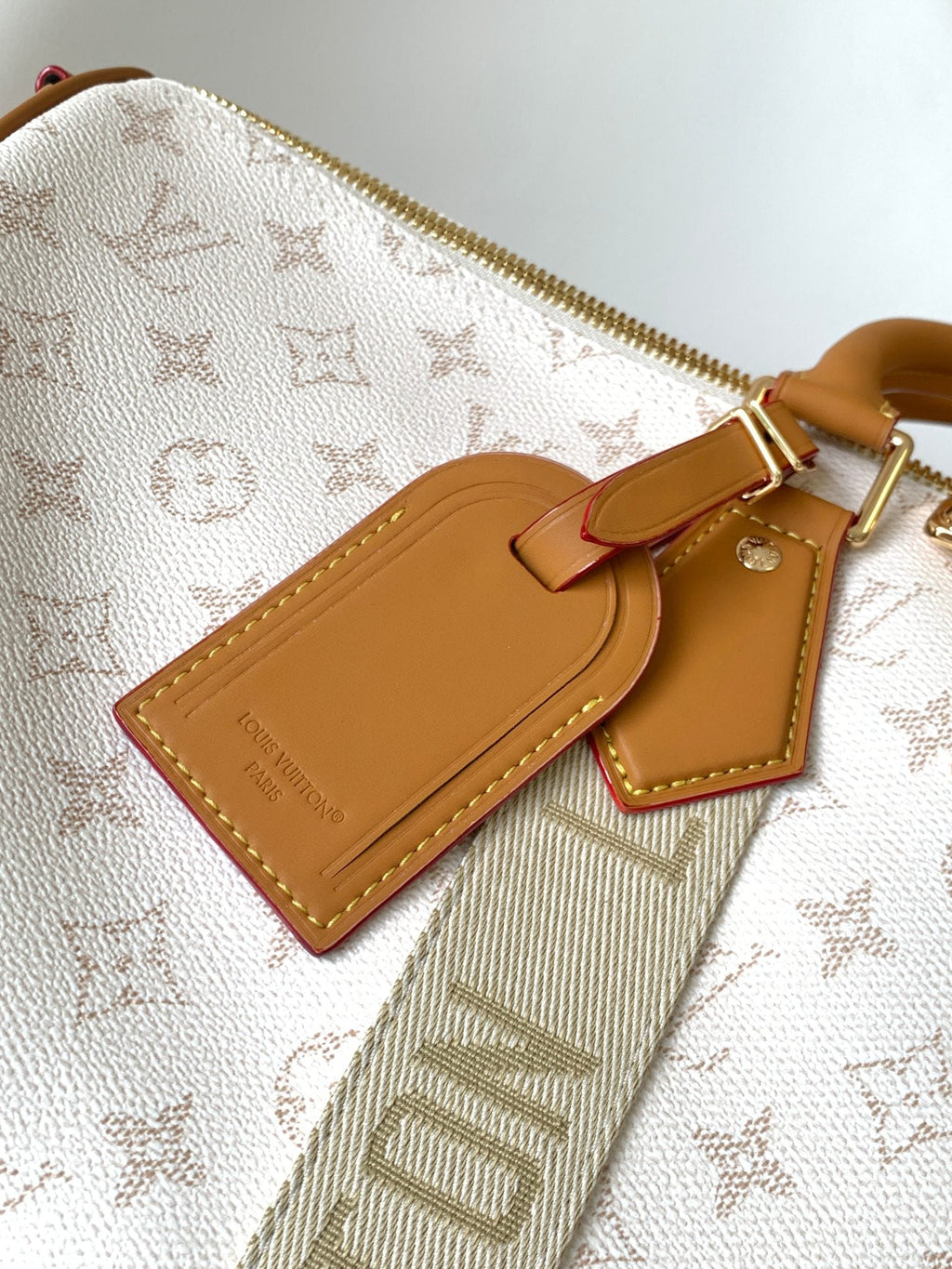 LOUIS VUITTON LV 25S KEEPALL BANDOULIÈRE BAG 45 IN WHITE MONOGRAM HERITAGE CALFSKIN
