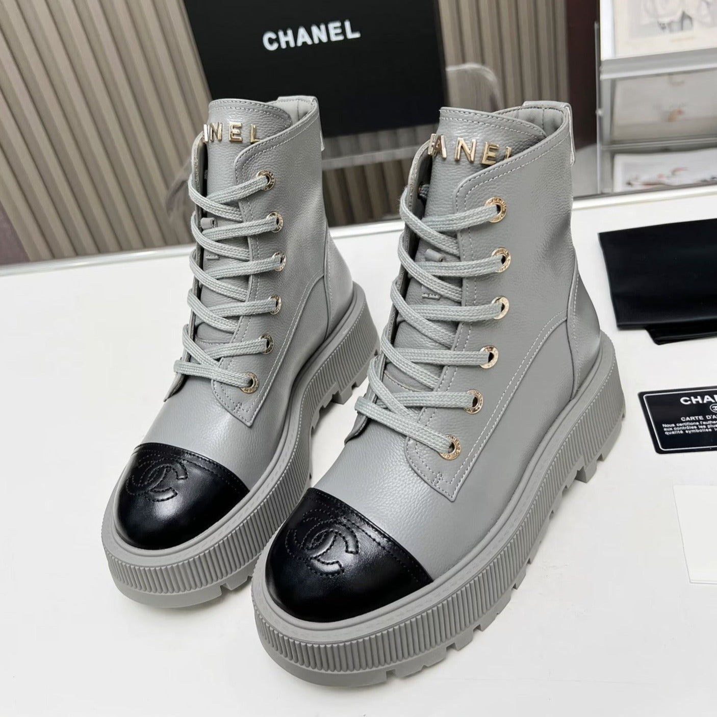 CHANEL SHORT BOOTS IN SLATE GREY MIX BLACK COWHIDE