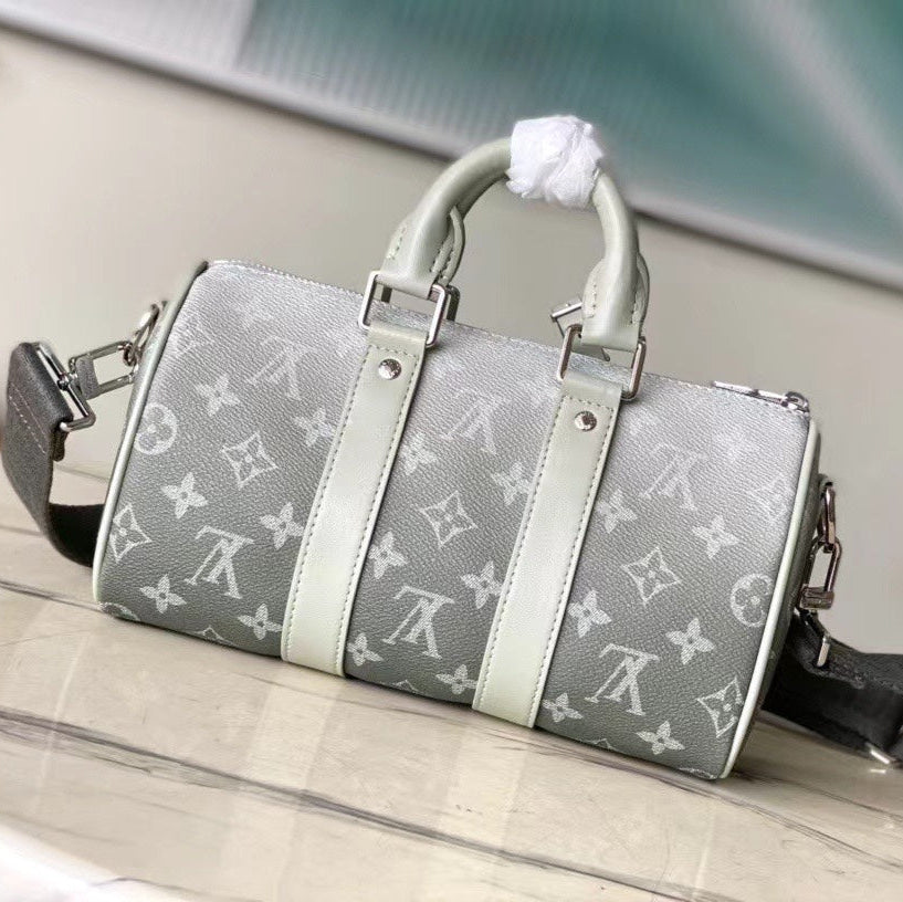 LOUIS VUITTON KEEPALL BANDOULIÈRE 25 IN GRAY MONOGRAM GRADIENT CANVAS