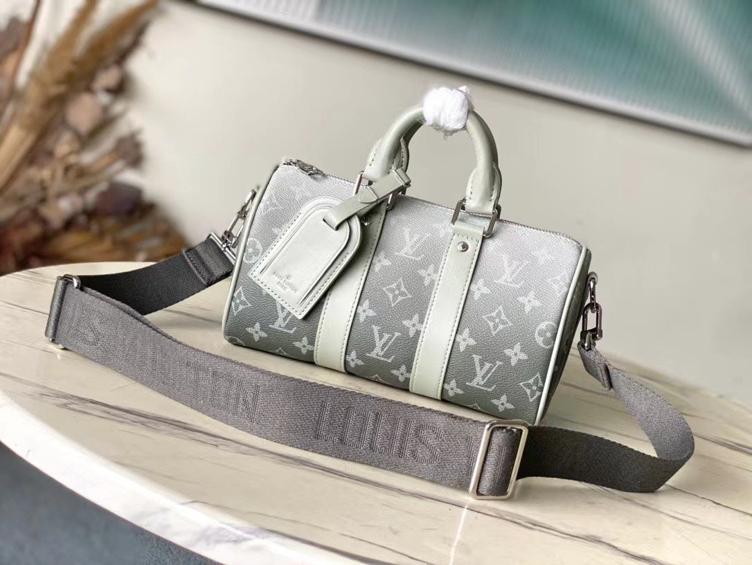 LOUIS VUITTON KEEPALL BANDOULIÈRE 25 IN GRAY MONOGRAM GRADIENT CANVAS