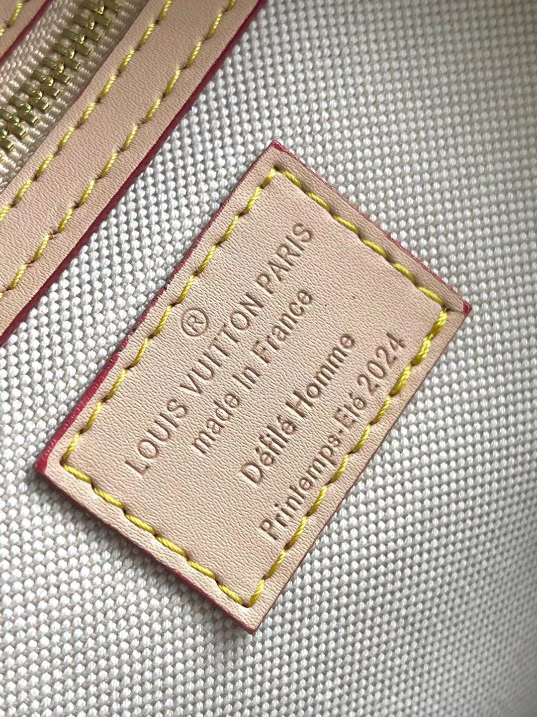 LOUIS VUITTON KEEPALL BANDOULIÈRE 50 IN PARFLECHE PATTERN MONOGRAM CANVAS