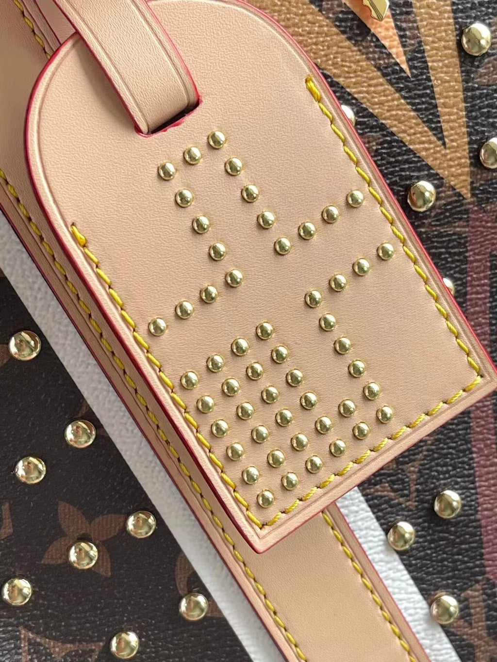 LOUIS VUITTON KEEPALL BANDOULIÈRE 50 IN PARFLECHE PATTERN MONOGRAM CANVAS