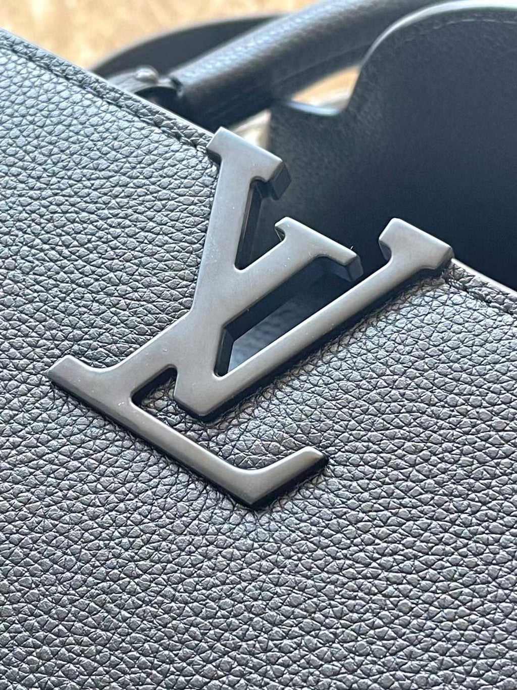 LOUIS VUITTON CAPUCINES EAST-WEST 27 IN BLACK TAURILLON