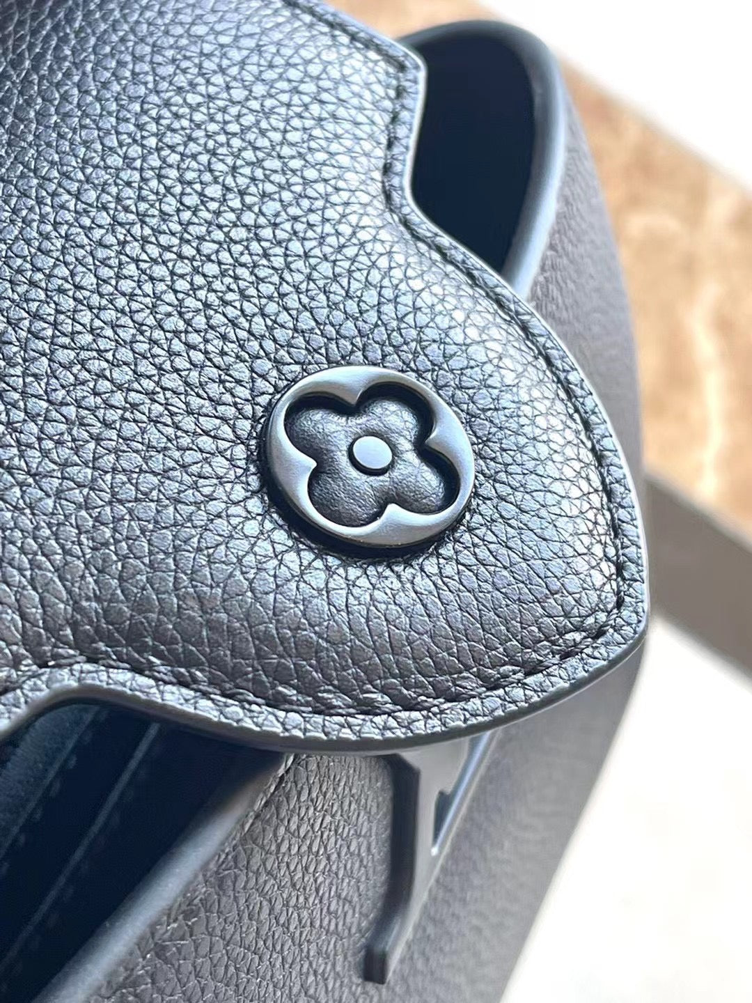 LOUIS VUITTON CAPUCINES EAST-WEST MINI 21 IN BLACK TAURILLON
