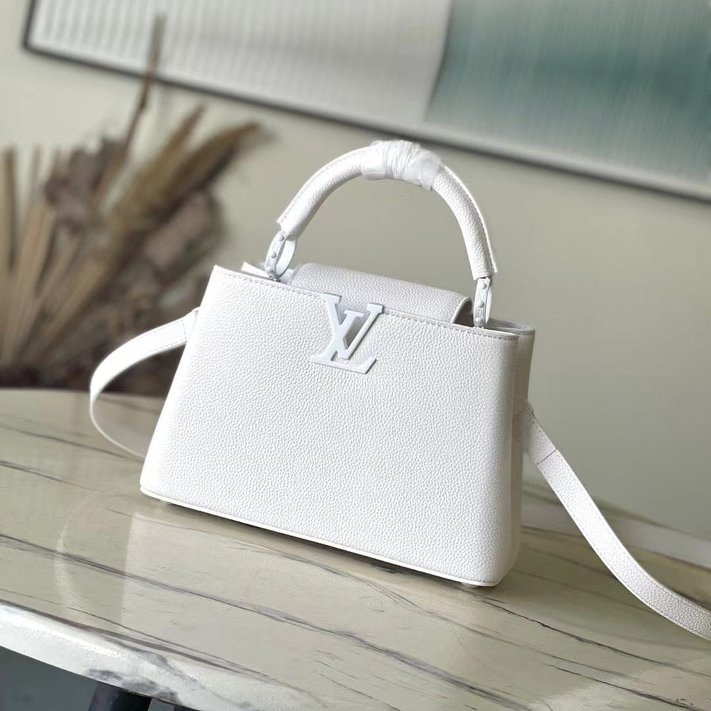 LOUIS VUITTON CAPUCINES EAST-WEST BB 27 IN WHITE TAURILLON
