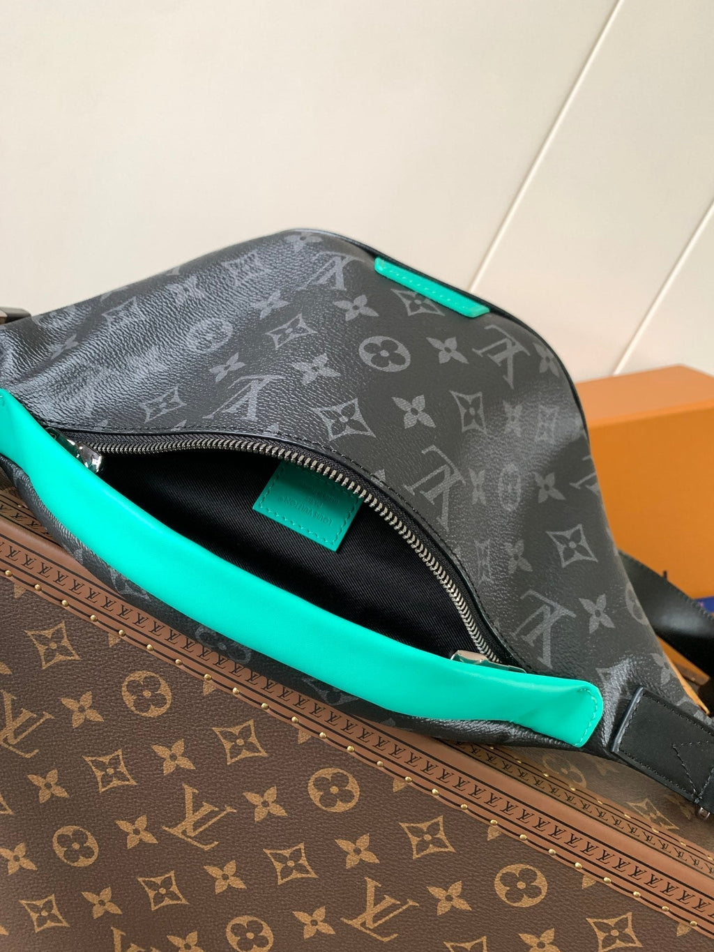 LOUIS VUITTON LV 25S DISCOVERY BUMBAG 44 IN BLACK AQUA MONOGRAM ECLIPSE CANVAS AND CALFSKIN