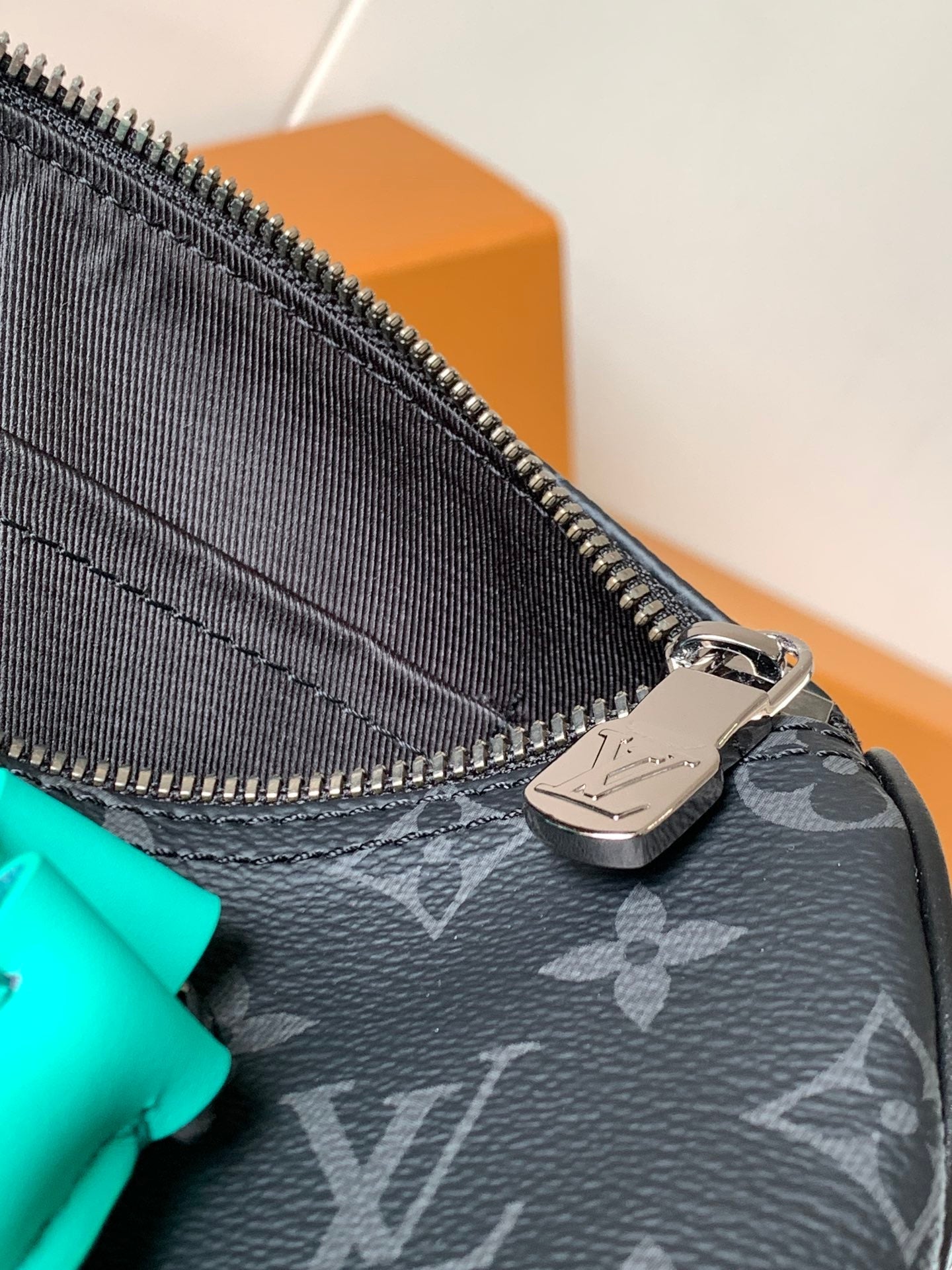 LOUIS VUITTON LV 25S KEEPALL 25 WITH SHOULDER STRAP IN BLACK AQUA COATED MONOGRAM ECLIPSE CANVAS AND CALFSKIN