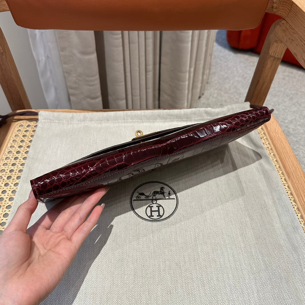 HERMES KELLY CUT 31 IN SANGRIA PURPLE ALLIGATOR LEATHER WITH GOLD HARDWARE