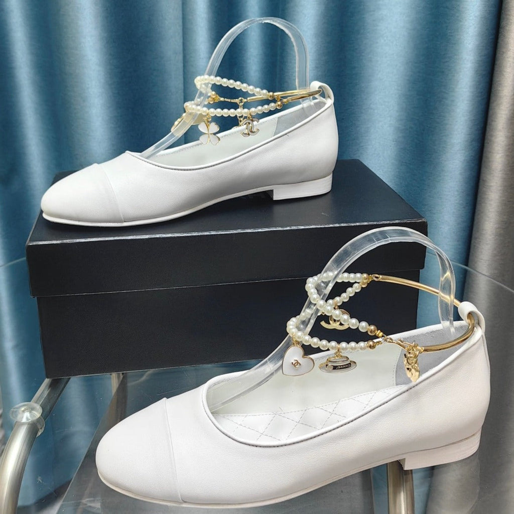 CHANEL MARY JANE WITH PEARL STRAP IN WHITE LAMBSKIN