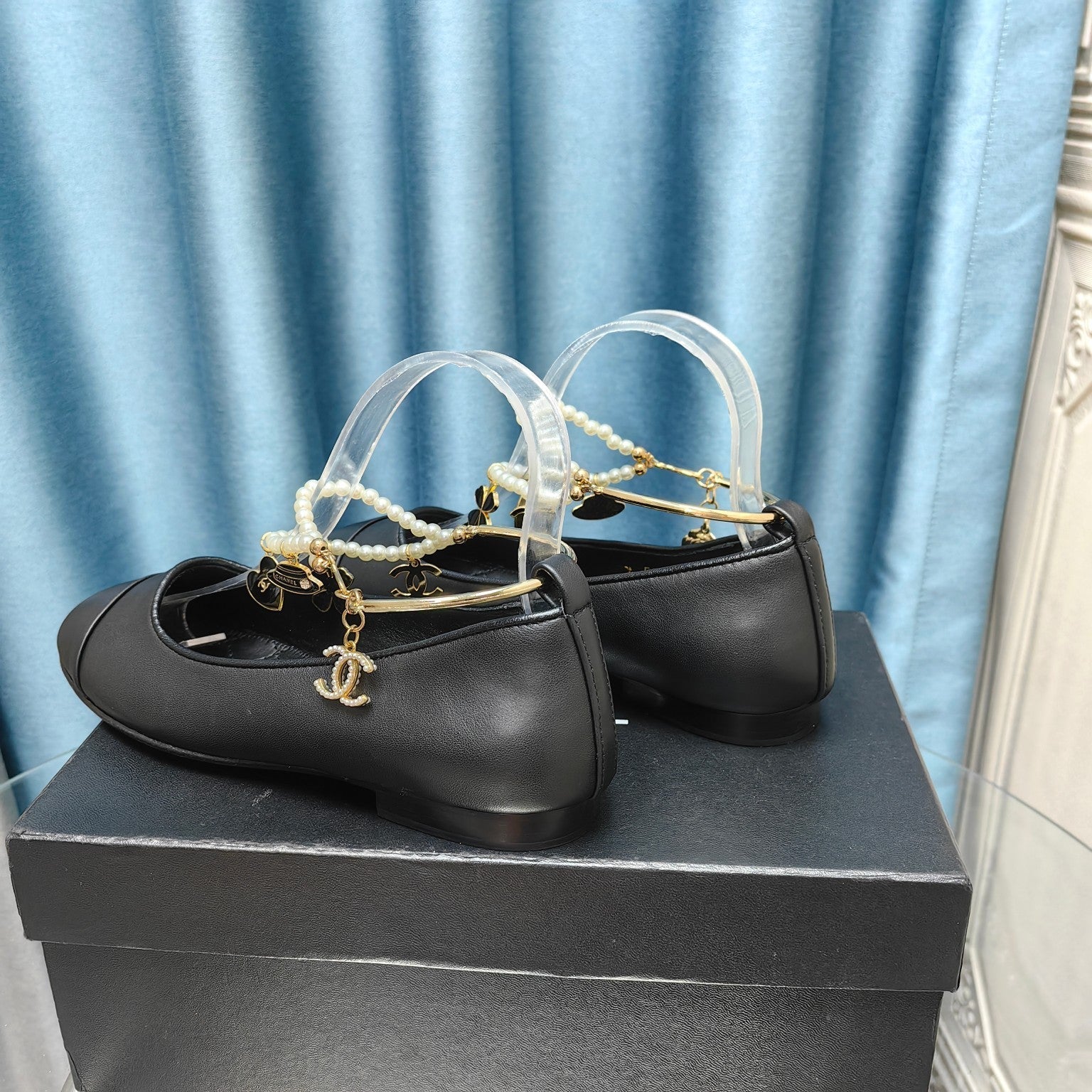 CHANEL MARY JANE WITH PEARL STRAP IN BLACK LAMBSKIN