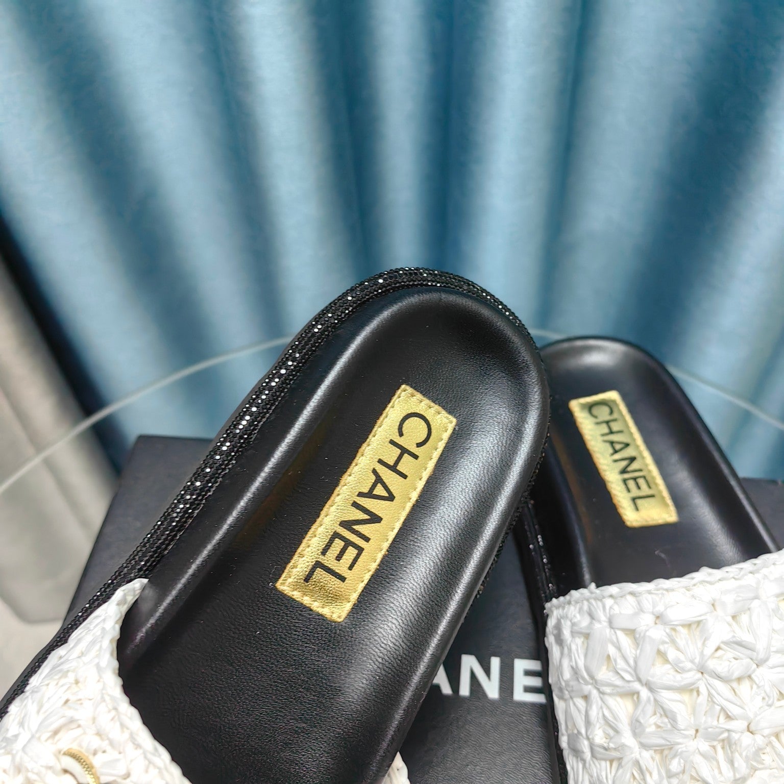 CHANEL KNIT SLIPPERS IN LIGHT PINK WOVEN SATIN AND BLACK SHEEPSKIN