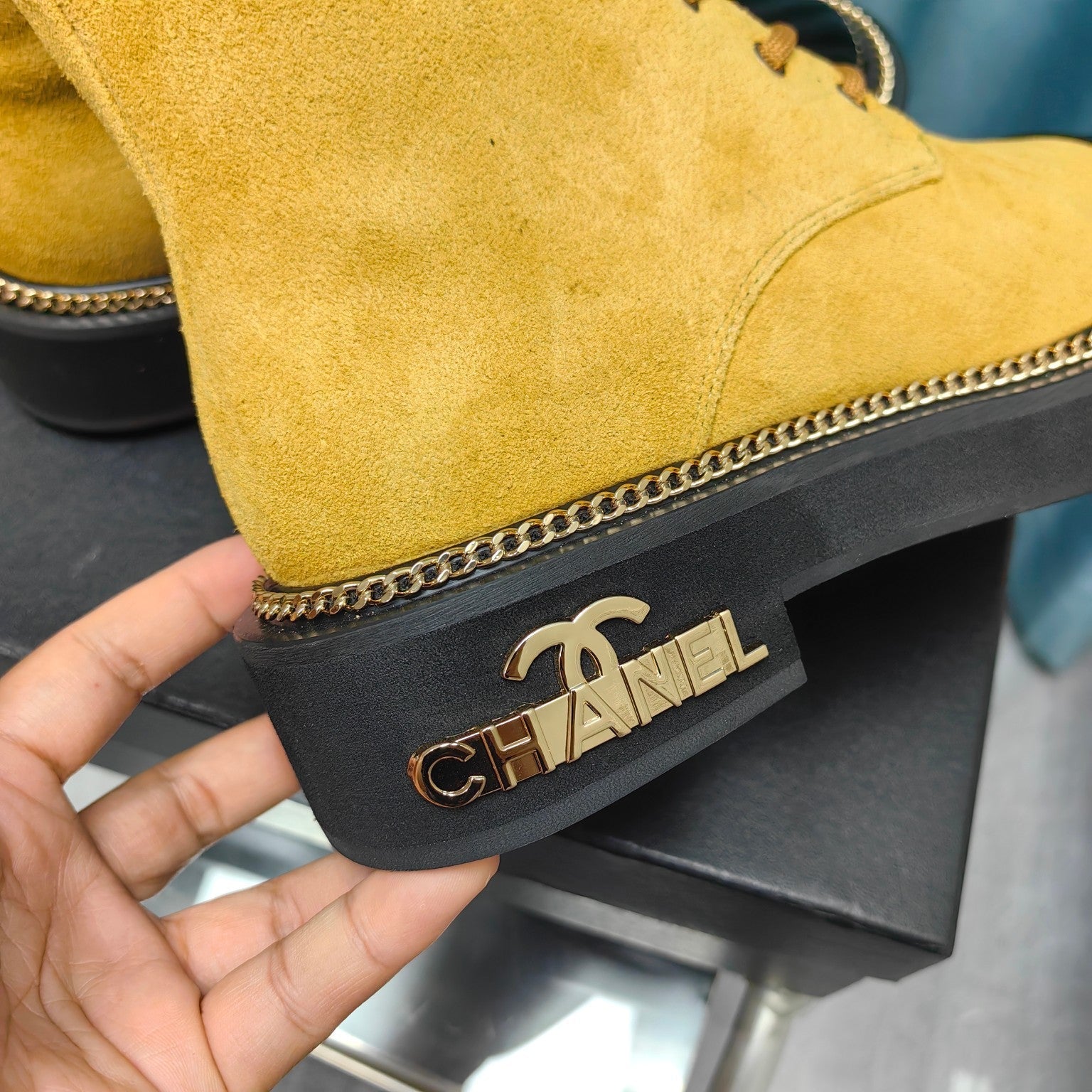 CHANEL SHORT BOOTS IN GOLD YELLOW SUEDE AND BLACK SHEEPSKIN