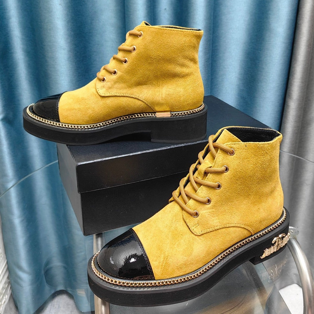 CHANEL SHORT BOOTS IN GOLD YELLOW SUEDE AND BLACK SHEEPSKIN