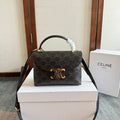 CELINE TEEN NINO BAG 20 IN BLACK TRIOMPHE CANVAS GOLD HARDWARE