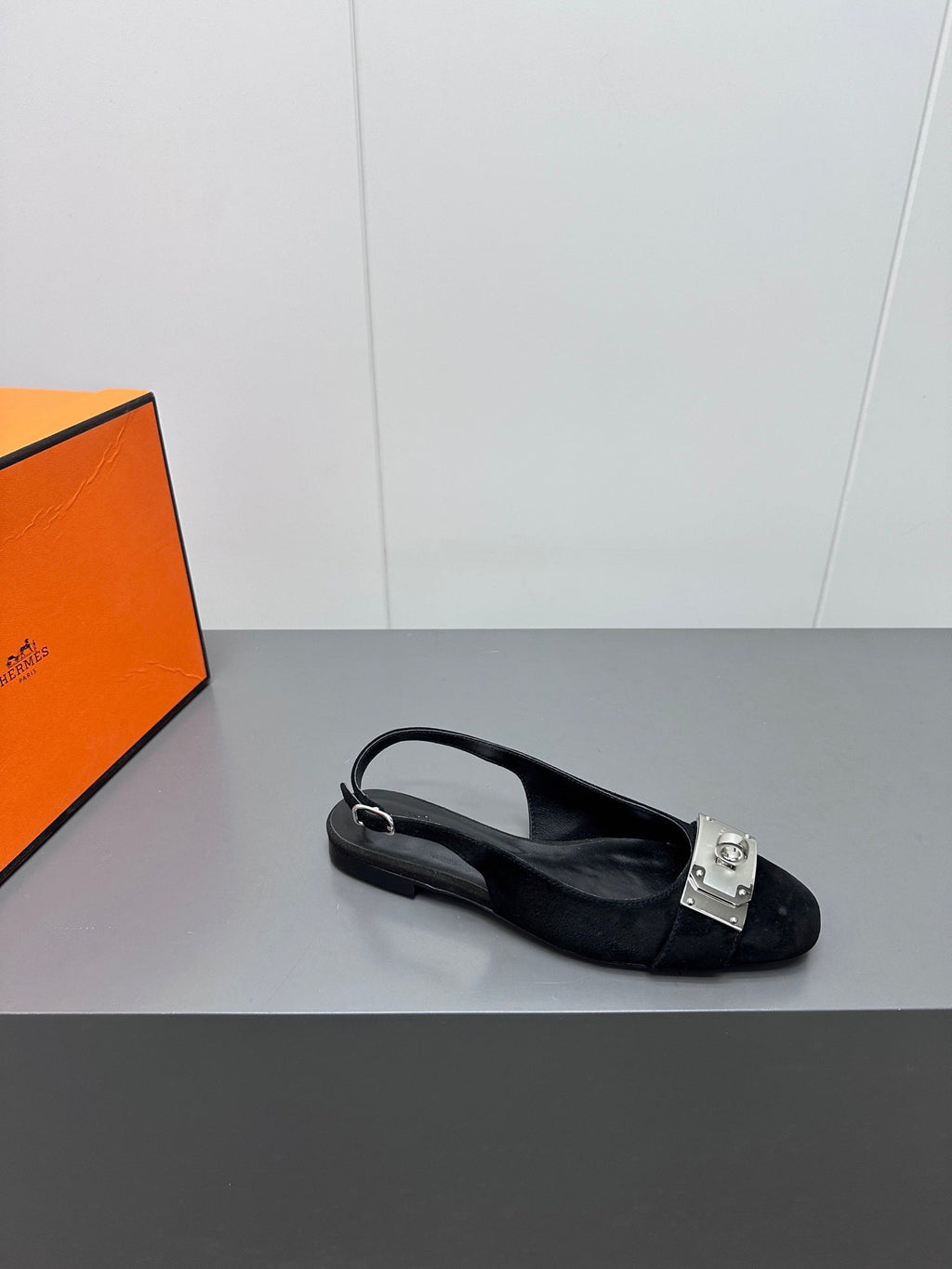 HERMES INNOCENTE SLINGBACK IN BLACK SUEDE