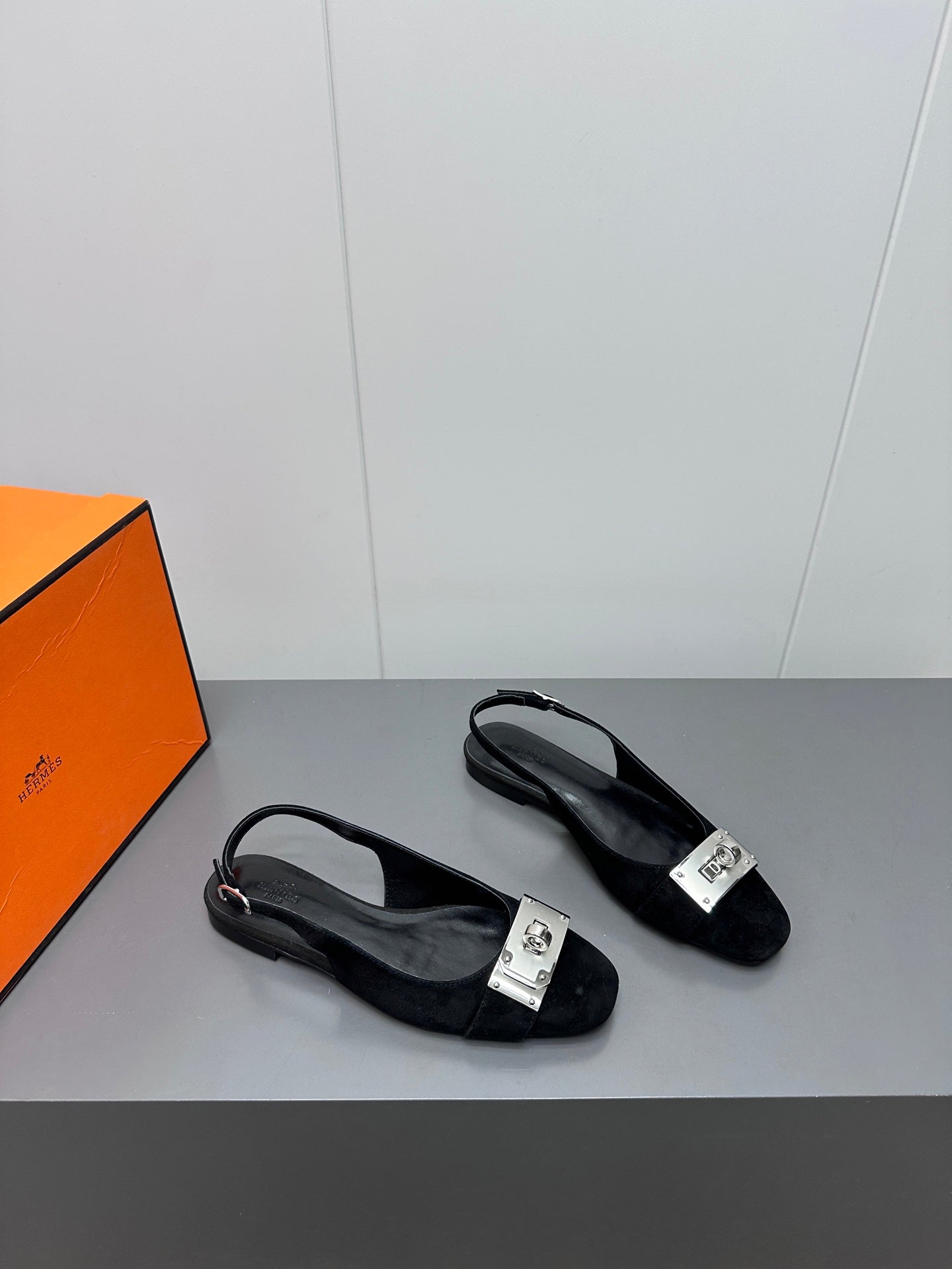 HERMES INNOCENTE SLINGBACK IN BLACK SUEDE