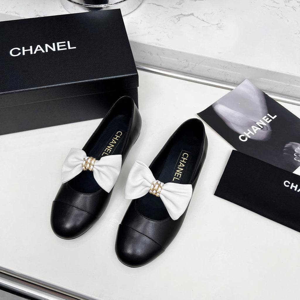 CHANEL 25S MARY JANES IN BLACK CALFSKIN WITH WHITE BOW GOLD HARDWARE