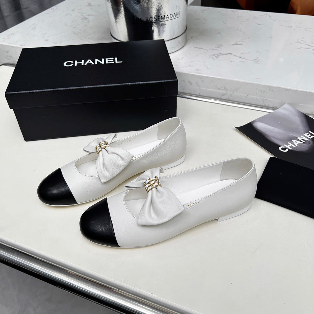 CHANEL 25S MARY JANES IN WHITE MIX BLACK CALFSKIN WITH BOW GOLD HARDWARE