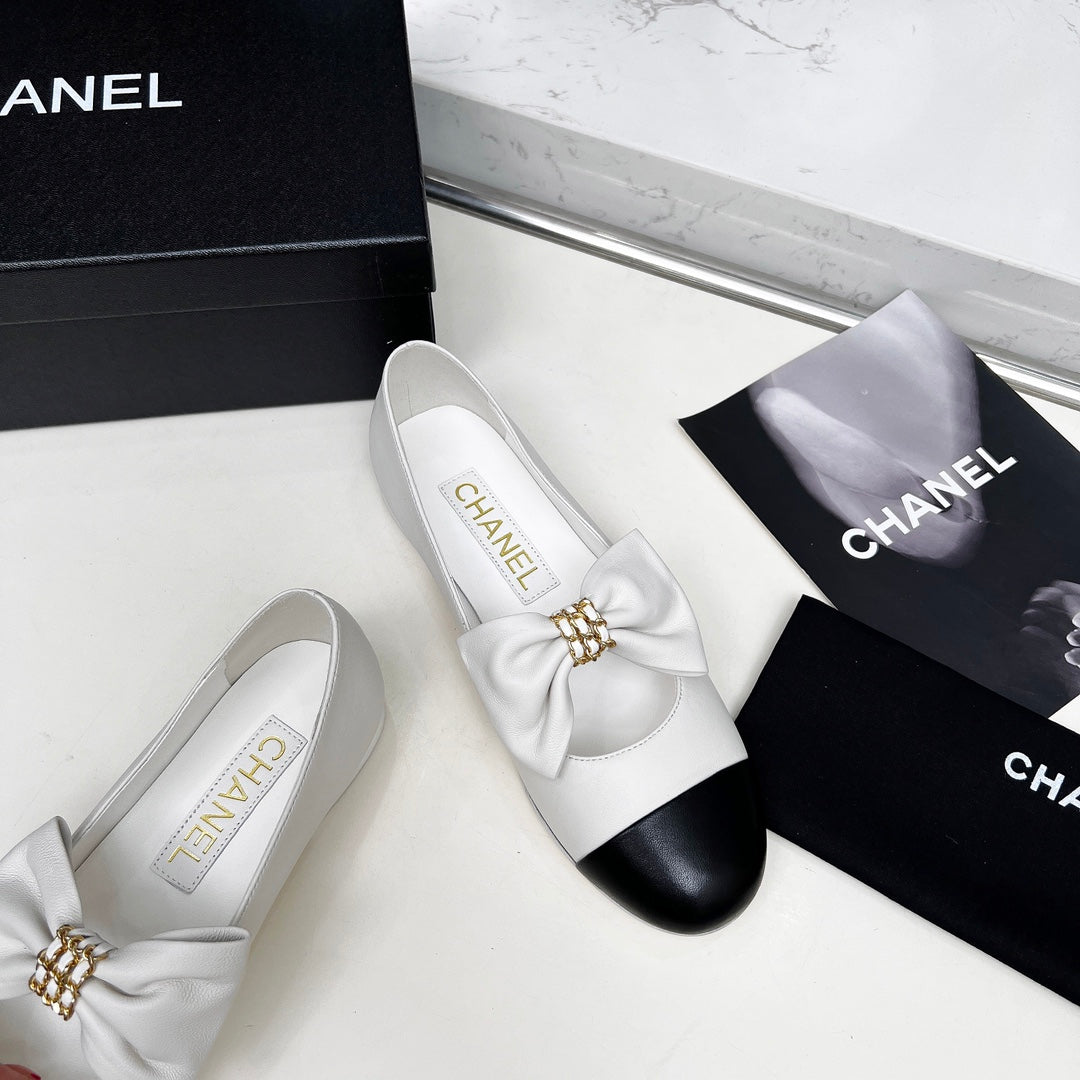 CHANEL 25S MARY JANES IN WHITE MIX BLACK CALFSKIN WITH BOW GOLD HARDWARE