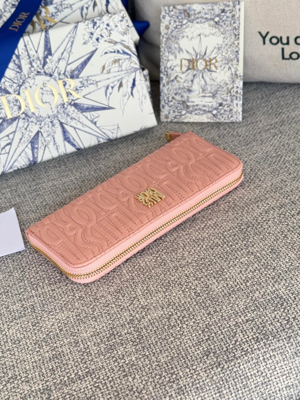 DIOR VERTICAL LONG ZIP WALLET 20 IN BABY PINK QUILTED ALLOVER CALFSKIN