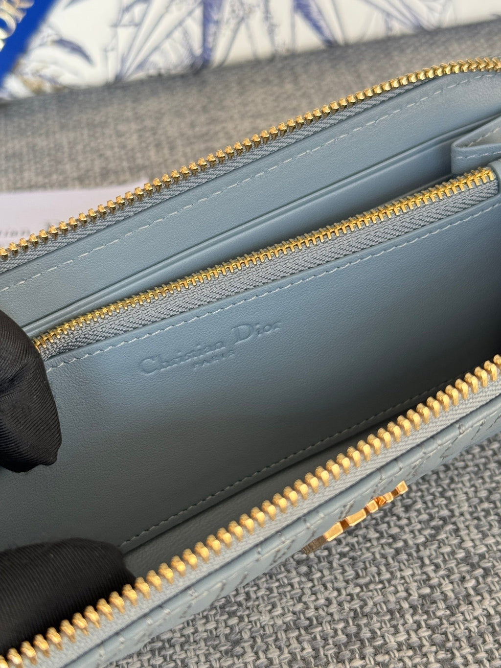 DIOR VERTICAL LONG ZIP WALLET 20 IN BABY BLUE QUILTED ALLOVER CALFSKIN