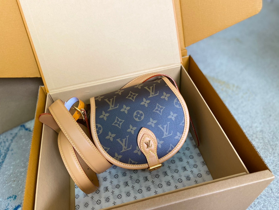 LOUIS VUITTON SADDLE BAG 18 IN BROWN MONOGRAM CANVAS AND LEATHER TRIM