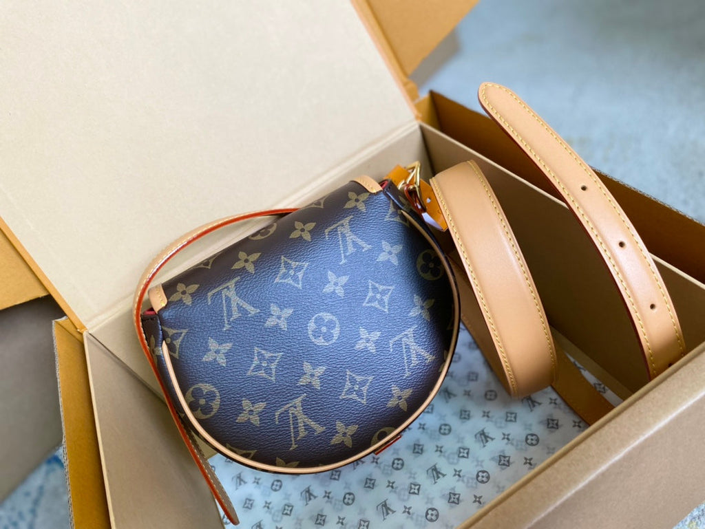 LOUIS VUITTON SADDLE BAG 18 IN BROWN MONOGRAM CANVAS AND LEATHER TRIM