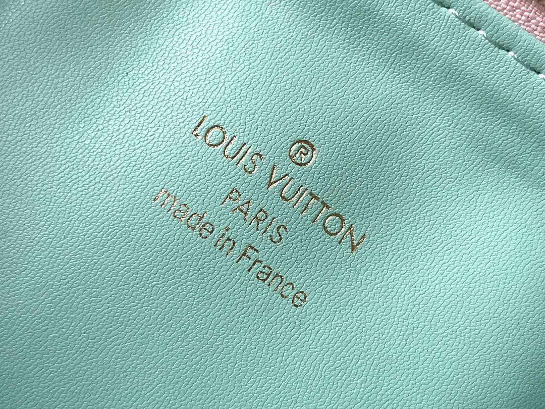 LOUIS VUITTON COUSSIN PM 26 IN JASMINE PINK MONOGRAM EMBOSSED LAMBSKIN