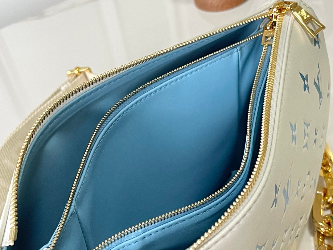 LOUIS VUITTON COUSSIN PM 26 IN WHITE BLUE MONOGRAM EMBOSSED LAMBSKIN GOLD HARDWARE