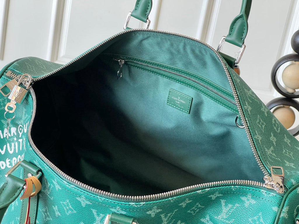 LOUIS VUITTON KEEPALL BANDOULIÈRE 50 IN GREEN MONOGRAM HERITAGE CANVAS