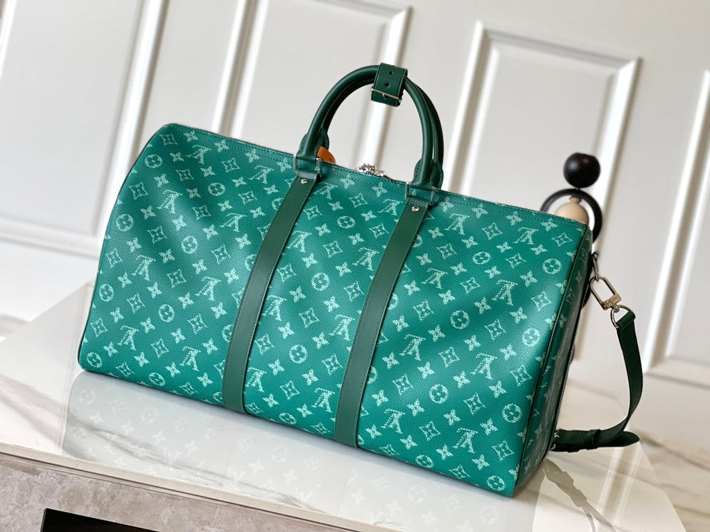 LOUIS VUITTON KEEPALL BANDOULIÈRE 50 IN GREEN MONOGRAM HERITAGE CANVAS